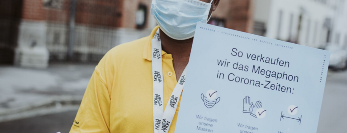 Ein Megaphon-Verkäufer präsentiert die neuen Verkaufsschutzmaßnahmen