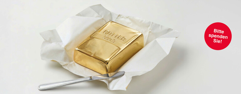 Caritas Haussammlung 2026 Sujet: vergoldete Butter mit Spruch "Weil das Leben so teuer ist wie nie. Wir helfen."